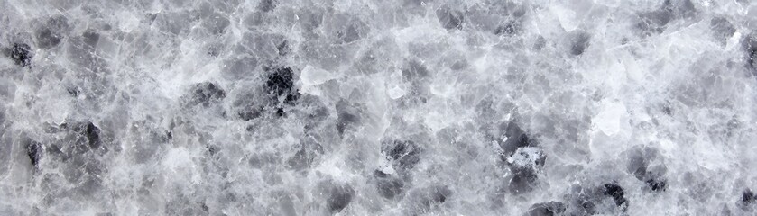 Abstract gray and white surface texture.