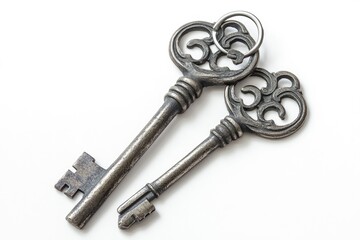 Antique keys resting on a white surface