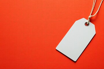 Blank price tag on red background