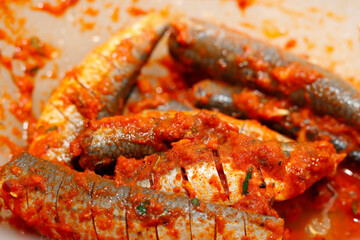 Spicy Kerala Sardine Fish Marinated in Masala for Traditional Indian Fry