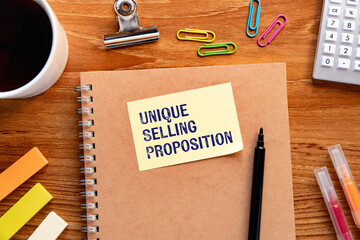 There is sticky note with the word Unique Selling Proposition. It is as an eye-catching image.
