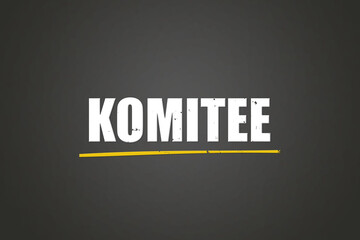 Komitee (Committee) - A blackboard with white text.