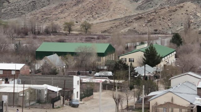 Aerial Perspective of Chos Malal Homes Nestled in Mountain Region of Argentina