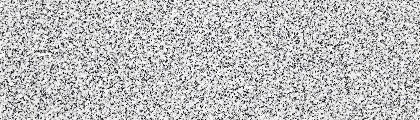 Abstract speckled grayscale surface pattern design.