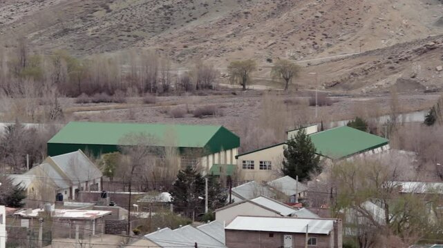 Aerial Perspective of Chos Malal Homes Nestled in Mountain Region of Argentina