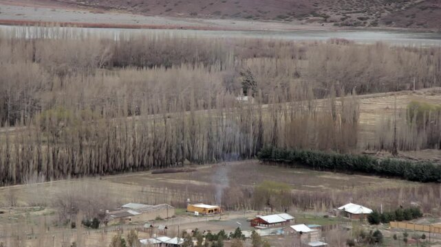 Smoke Rising From Chimney Over Patagonian Homes in Chos Malal, Neuquen Province, Argentina