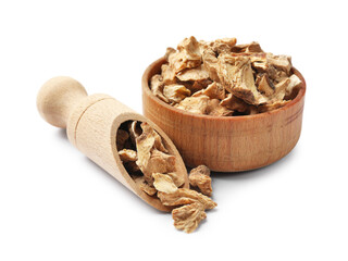 Pieces of dry chicory roots in bowl and scoop isolated on white