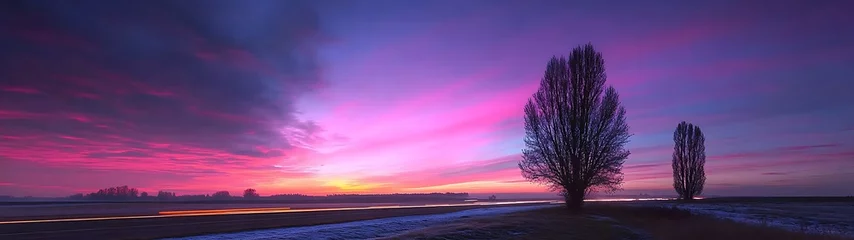 Fototapete Vibrant sunrise over a serene landscape © Bujang