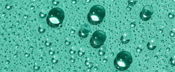 Water drops on mint background