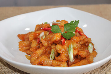 A plate of stir-fried flour potatoes. A delicious dish