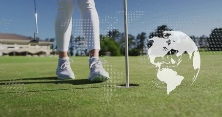 Golf player gripping flagstick on green, overlaying animated world map for business analytics - Powered by Adobe