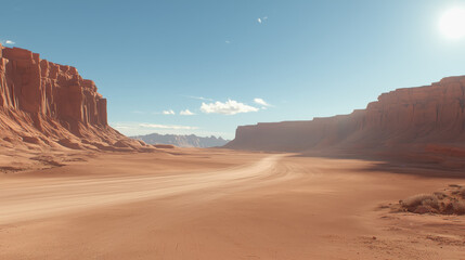 Fototapeta premium Vast desert landscape with rocky canyon layers and a winding road cutting through the arid terrain under clear skies