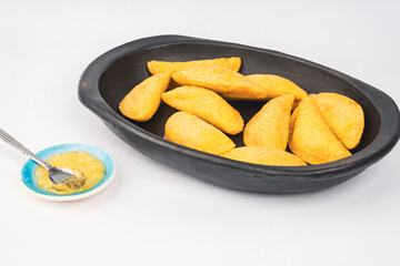 Delicious traditional Colombian empanadas with spicy sauce