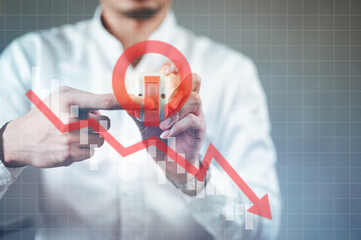 Economic Shutdown – Crisis, Collapse, and Market Downturn, Hand pressing the off switch button