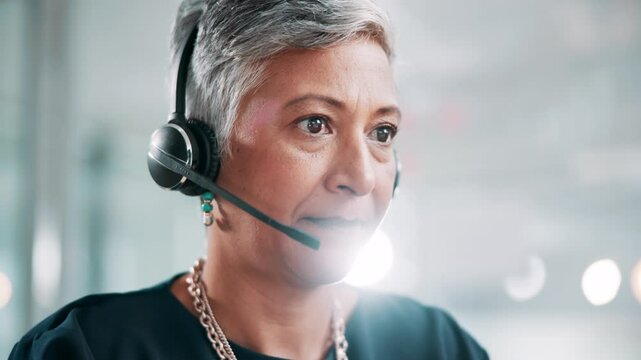 Call center, chat and mature woman with headset for customer service, help and multilingual support agent. Happy consultant, face and talk for assistance with faq, solution or language translation