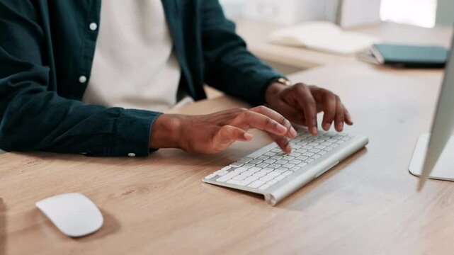 Hands, typing and man at desk for creative writing, copywriting or journalism for online blog. Keyboard, computer and review, content writer with editing and research for article at media agency