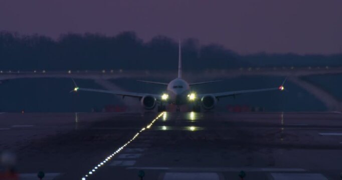 Plane Takes Off in Purple Twilight
