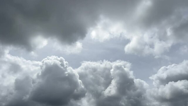 Dramatic cloudy sky with heavenly open light shining trough heavy gloomy clouds. Religious Hope concept background. No people. Copy space