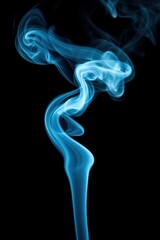 Obraz premium Turquoise smoke trails rise against black background studio shot abstract flowing pattern artistic ethereal