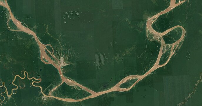 Aerial View of the Amazon Rainforest and Winding Rivers