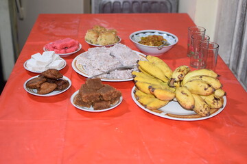 Sinhala and Hindu New Year table full of sweets. sri lanka new year traditional food table. south...