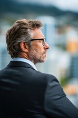 Business owners Startups Investment Capitalism concept. Professional man looking thoughtfully into the distance.