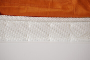 Close-up of bedding showing mattress ,