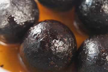 Indian Sweet dessert balls soaked in syrup 