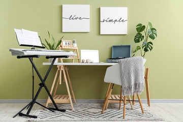 Fototapeta premium Interior of room with musician's workplace, record player and synthesizer