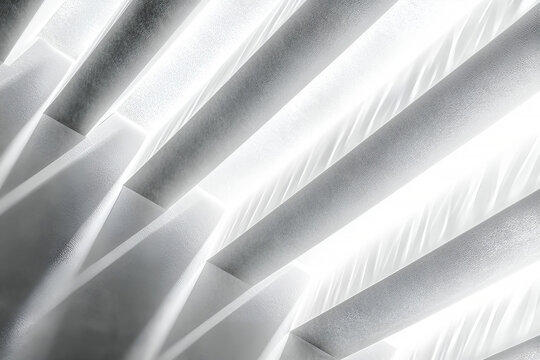 Abstract architectural design featuring repeating parallel structures with dramatic lighting and deep shadows creating a modern aesthetic.