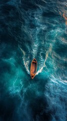 Aerial view of a wooden boat moving on the blue ocean water