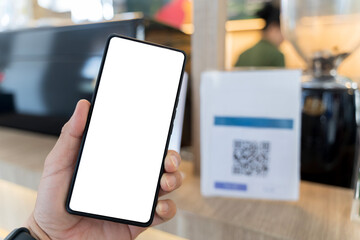 Customer self-scanning apps for self-checkout. Close-up of woman holding smartphone with blank screen.
