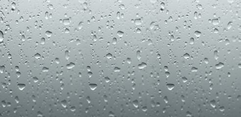 Water droplets on a gray background.