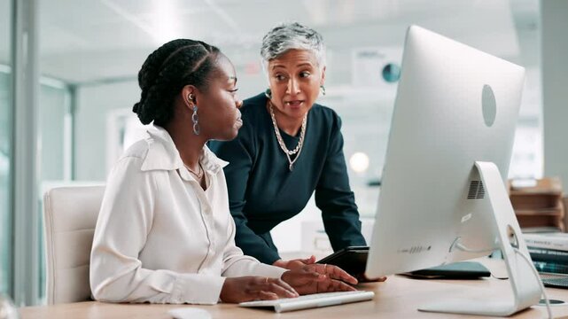 Call center, manager and women with computer, explaining and advice for work in business and pointing. Training, mature mentor and helping employee for telemarketing, teamwork and planning for sales