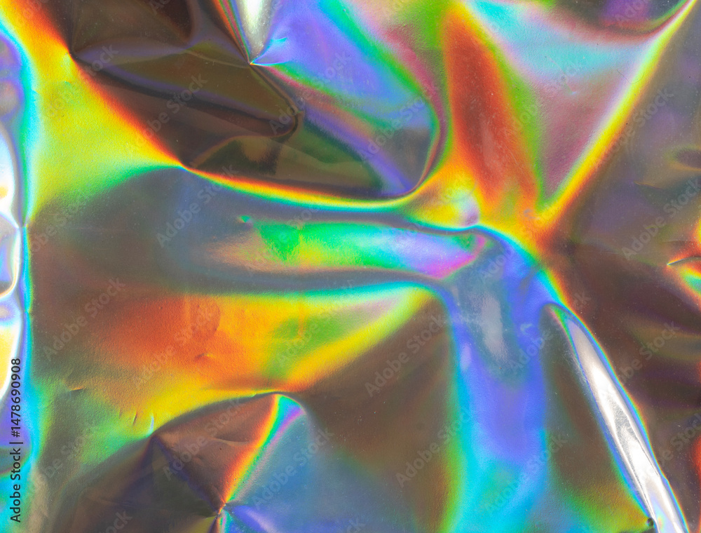Poster hologram surface wrinkled with rainbow texture background