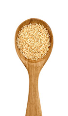top view flat lay pile of amaranth seed grain whole in wood spoon cutout