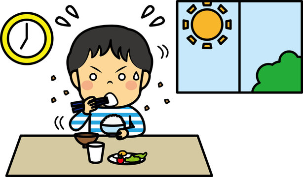 焦って朝食を食べる小学生男児
