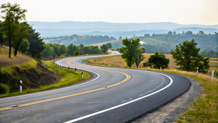 Fototapeta premium Scenic Countryside Road with Curves and Verdant Surroundings in a Serene Landscape
