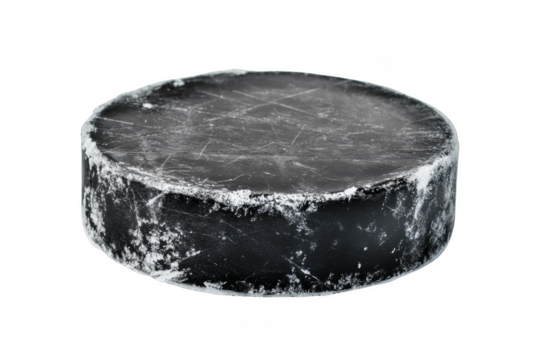 Hockey puck on a sports equipment studio shot isolated close-up focused on detail