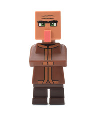 Fototapeta premium Editorial illustrative image of lego minecraft movie minifigure of farmer isolated on white