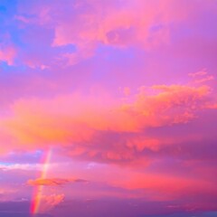 Fototapeta premium A breathtaking sky painted with vibrant rainbow hues, blending seamlessly from deep violet to bright red, creating a stunning natural spectacle at sunset.