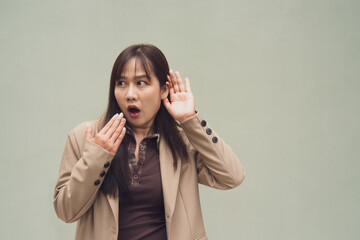young woman listening something shocking and surprsing