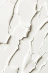 Obraz premium Close-up of White Cream Texture Smear Pattern, Abstract Background, Top-Down View, Studio Shot, Beauty Product, Skin Care, Cosmetic Ingredient