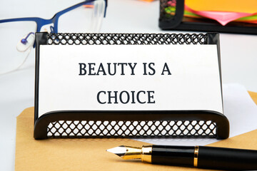 Diet. Dieting concept. Healthy Food. BEAUTY IS A CHOICE written close-up on the business card