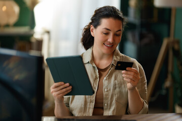 Woman is doing online purchases