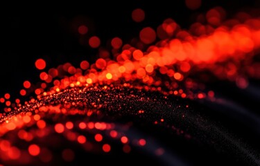Abstract red light streaks on dark surface.