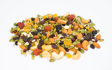 Mix of nuts and dried fruits on white background, healthy food.