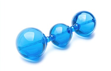 Fototapeta premium Three translucent, vibrant blue, spherical beads connected by a clear rod