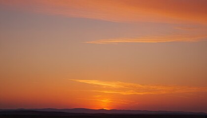 Vertical shot of the golden sunset sky over the Pacific Ocean
1
