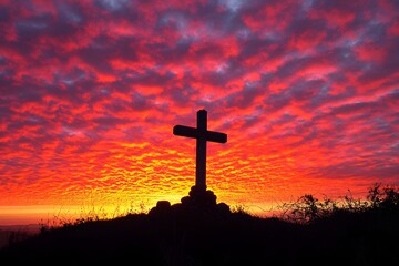 Wooden cross on hill